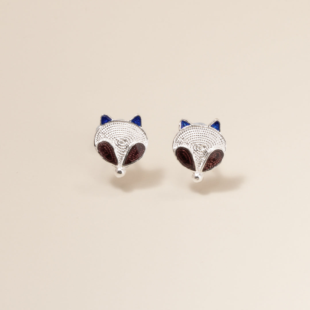 Ebnix Moonlit Fox Cloisonné Enamel Stud Earrings with a silver face, brown eyes, and blue ears, set on a luxurious S999 silver base.